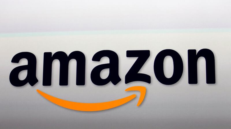 FILE - The Amazon logo is seen, Sept. 6, 2012, in Santa Monica, Calif. (AP Photo/Reed Saxon,...