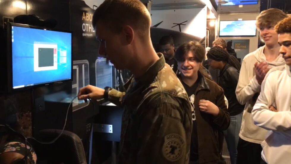 The U.S. Army recruitment team brought along its Special Operations simulation truck to show...