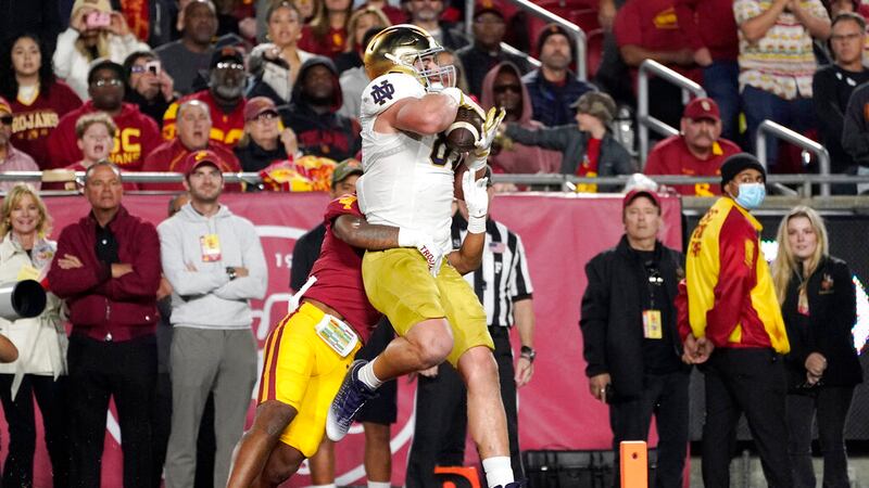 Notre Dame tight end Michael Mayer, right, makes a touchdown catch as Southern California...
