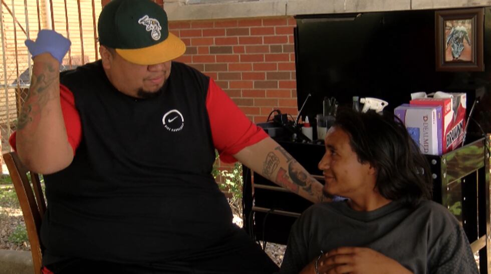 John Romo cutting hair in 2018.