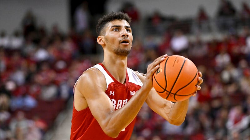 Bradley forward Malevy Leons (14) shoots a free throw against Arkansas during an NCAA college...