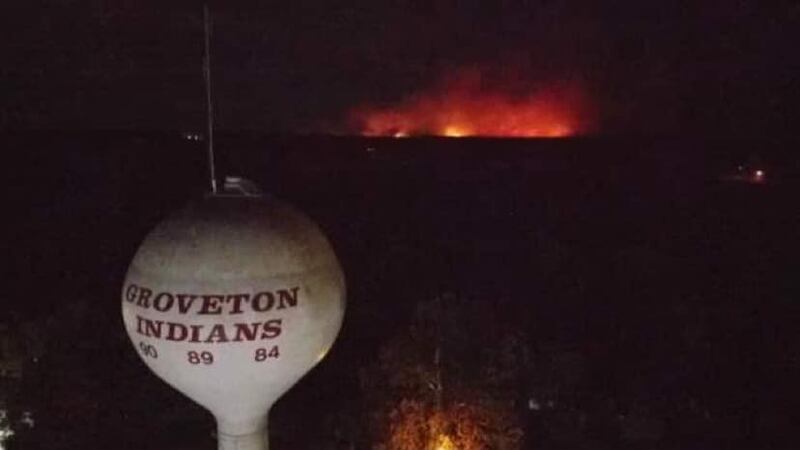 Multiple fire departments and Texas A&M Forest Service are working to contain a Trinity County...