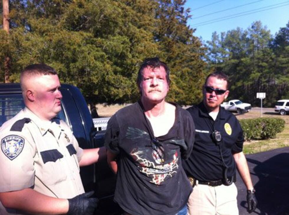 David Hunter is escorted by law officers (Source: Trinity County Sheriff's Office)