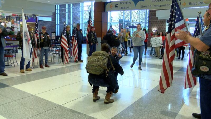 Thomas White, 5, was surprised to see his mom, Amanda Riley, after almost a year.
